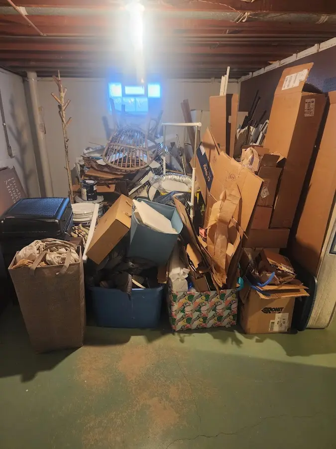 Roll-off dumpster container at job site for 2 Yard Dumpster Rental in Colerain